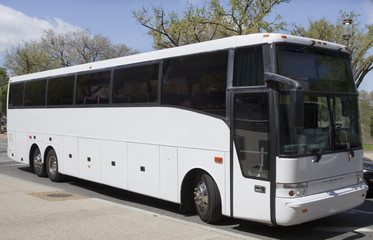 parked white tour bus
