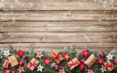 Wall Mural - fir tree branches with advent calendar stars and gift boxes