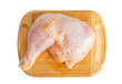 Chicken quarter on a wooden board. On white, isolated background.Top view. Flat lay.