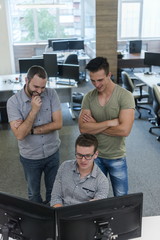 startup business people group working as team to find solution