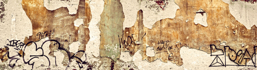 Old vintage red brick wall with fallen plaster for background.