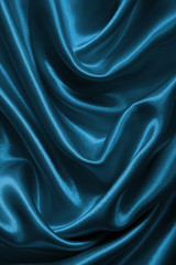 Smooth elegant blue silk or satin as background