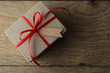Brown Gift Box with Red Ribbon and Blank Tag