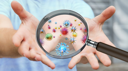 Poster - Close up on a sick man hand through magnifying glass transmittin