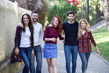 Wall Mural - Group of young people together outdoors in urban background