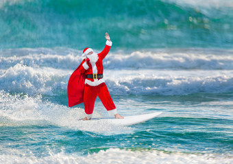 Sticker - Santa Claus windsurfer with gifts sack surfing at ocean waves