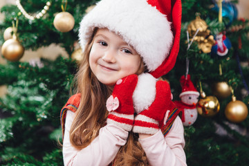 Beauty portrait of little girl in red hat