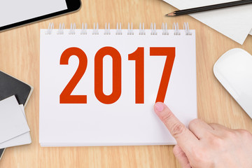Poster - Hand point at 2017 year number on notebook and technology device