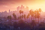 Fototapeta  - Los Angeles hot sunset view with palm tree and downtown in background. California, USA