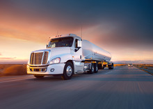 Truck Cistern And Highway At Sunset - Transportation Background