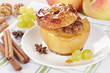 Apple baked with honey, nuts and raisins