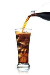 Wall Mural - Cola is pouring into glass on white background