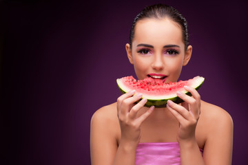 Beautiful woman eating tasty watermelon 