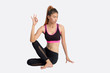 © Look Aod 27 - Young woman in yoga pose.