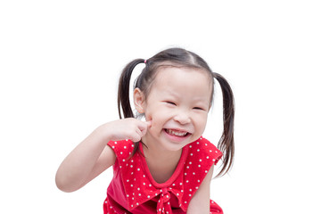 Wall Mural - Little asian girl smiling over white background