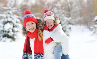 Poster - happy family mother and child daughter having fun, playing at wi