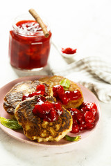 Wall Mural - Buckwheat pancakes with strawberry sauce