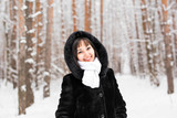 Fototapeta Koty - Young woman winter portrait
