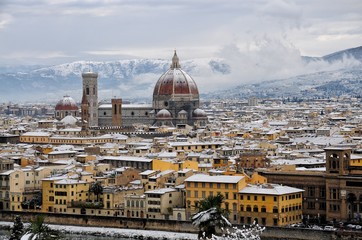 Cathedral Santa Maria del Fiore (Duomo) and Giottos Bell Tower (Campanile), in winter with snow Florence, Tuscany, Italy