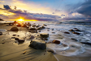 Wall Mural - sunset over the stormy sea