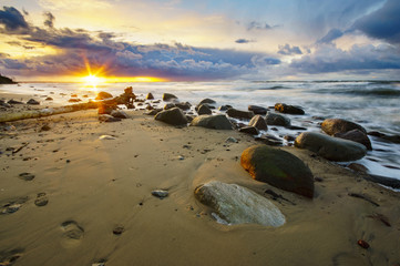 Wall Mural - sunset over the stormy sea