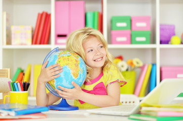 student girl  with books and laptop