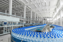 For The Production Of Plastic Bottles And Bottles On A Conveyor Belt Factory