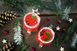 Cranberry punch for winter and Christmas on wooden background. Christmas concept. Eye bird view.