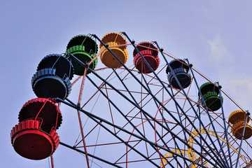 Wall Mural - Ferris wheel on the background of blue sky