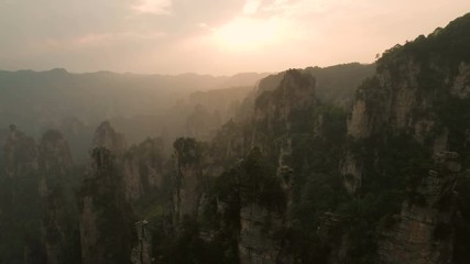 Wall Mural - rock formations, mountain scenery at sunset, drone shot china