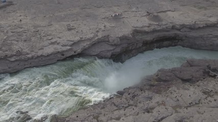 Wall Mural - rotating aerial footage of the hukou waterfalls