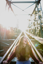 Stylish Girl Laughing At Grinder Bridge.