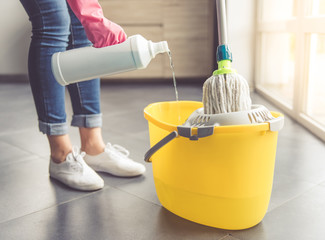 Woman cleaning her house