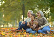 © aletia2011 - Grandparents and grandson in autumn park