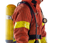 Close Up Single Fireman In Fire Fighting Protection Suit Isolated On White Background