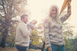© chika_milan - Dad, mom and son flying a kite in nature