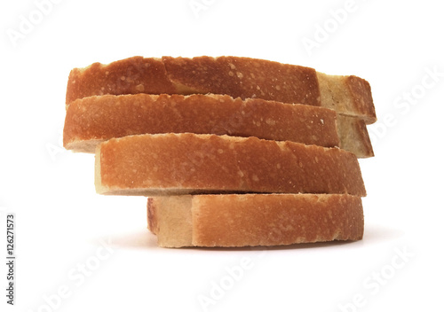 Fotografie, Obraz Stacked sliced bread on a white background