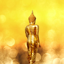 Golden Buddha Statue From Wat Khao Noi In Nan Thailand Under Dreamy Bokeh Background