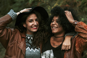 friends having fun and smiling outdoors