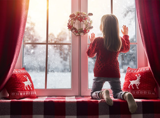 Poster - girl sitting by the window