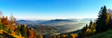 Fototapeta Fototapety góry  - Aerial view of colorful autumnal mountains, foggy sunset