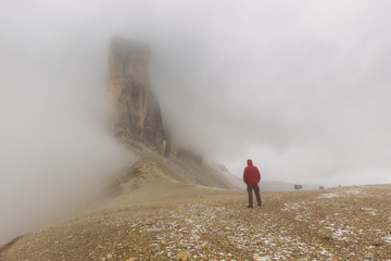 Wall Mural - Man standing on the Drei Zinnen Lavaredo