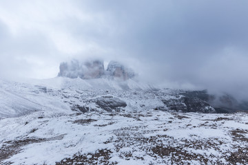 Wall Mural - Snowy day, overcast skies on the Drei Zinnen Lavaredo