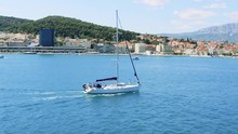 Sailing Boat Entering Harbour In Split, Panning Shot, View Of Seafront