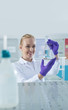 © Myvisuals - Portrait of a female researcher doing research in a lab