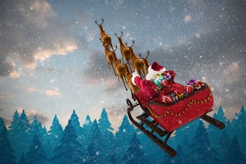 Poster - Composite image of high angle view of santa claus riding on sled
