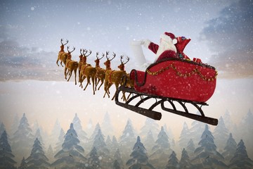Poster - Composite image of santa claus riding on sled during christmas