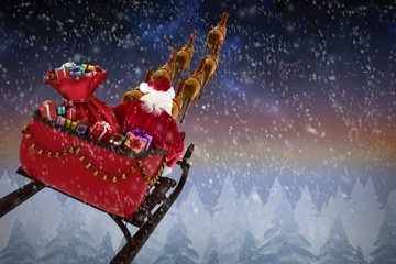 Wall Mural - Composite image of high angle view of santa claus riding on sled