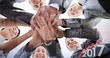 © vectorfusionart - Composite image of business team standing hands together