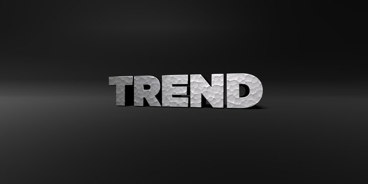 TREND - hammered metal finish text on black studio - 3D rendered royalty free stock photo. This image can be used for an online website banner ad or a print postcard.